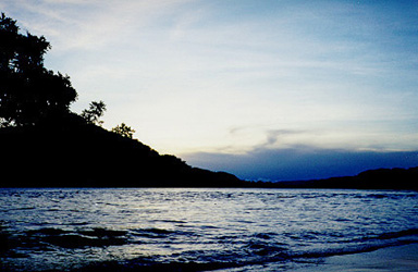 The sun setting over the Rio Caura